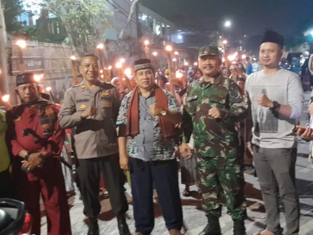 Babinsa Koramil 05/KJ Amankan Pawai Obor Tahun Baru Islam 1445 H dan Santunan Anak Yatim