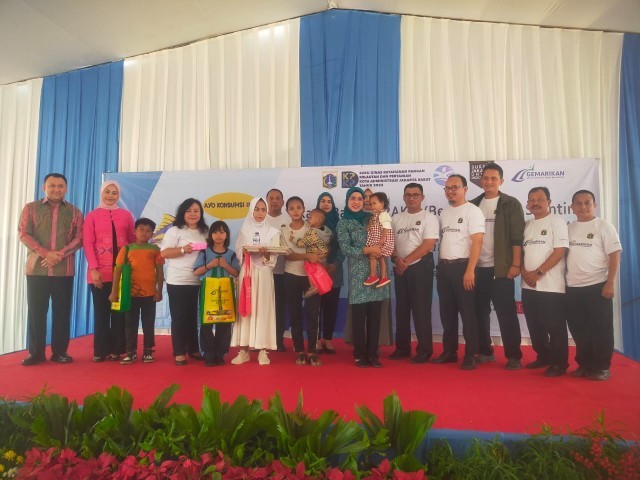 Babinsa Koramil 02/TB Serma Mi'an dan Serda Sarip Monitoring Giat Sosialisasi Gemar Makan Ikan di RPTRA Kalijido