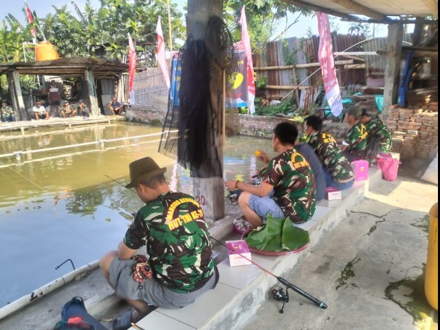Koramil 03/Teluk Pucung Gelar Lomba Mancing Mania dalam Rangka HUT ke-79 TNI